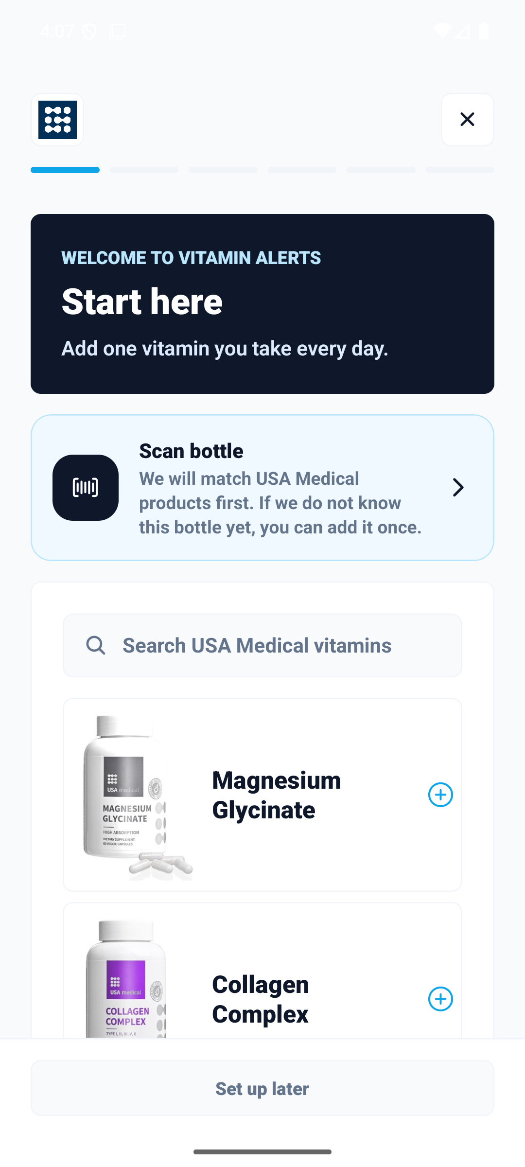 The Vitamin Alerts setup screen showing a bottle scanner and USA Medical vitamins that can be added to a routine.
